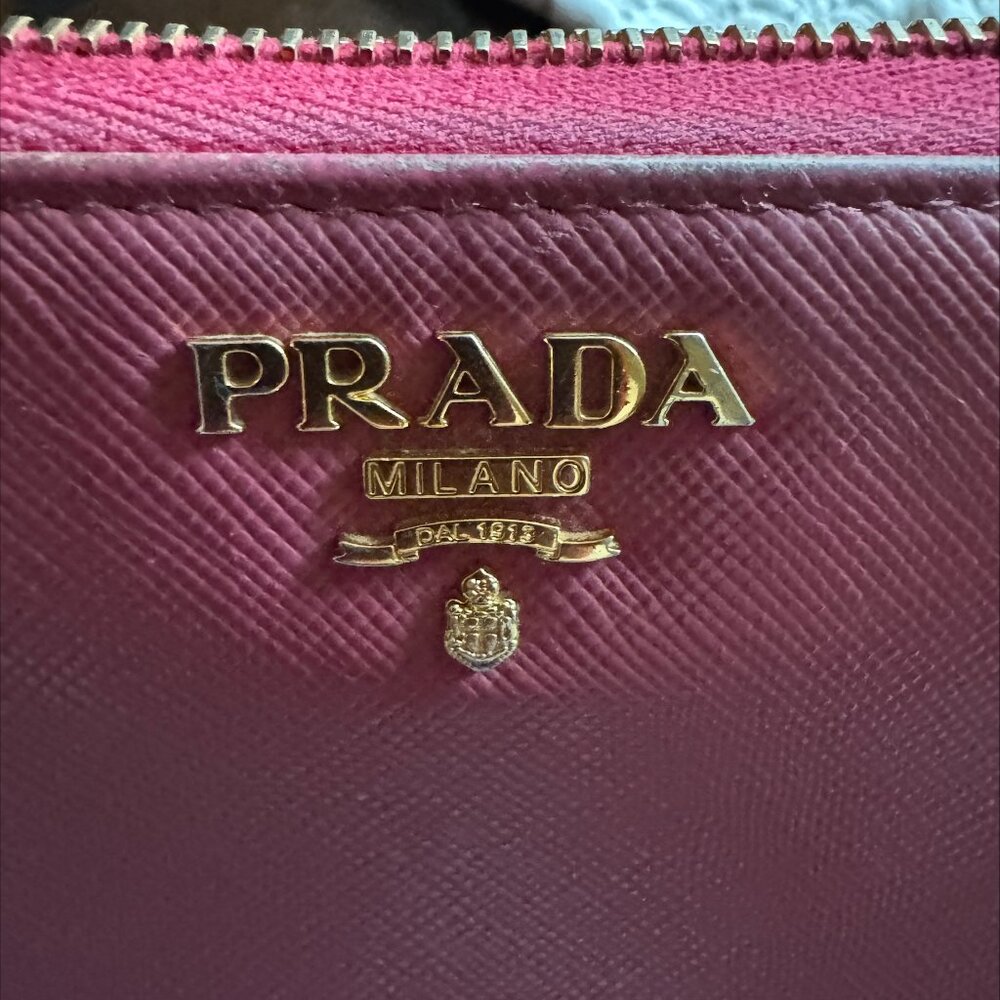 Prada zippy wallet - orinally priced at 1K from Posher